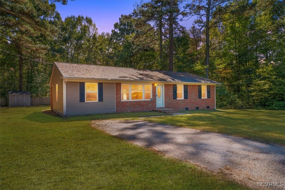 9217 South Quay Road Suffolk, VA 23437 - Photo 1 of 46 a view of a house with a backyard