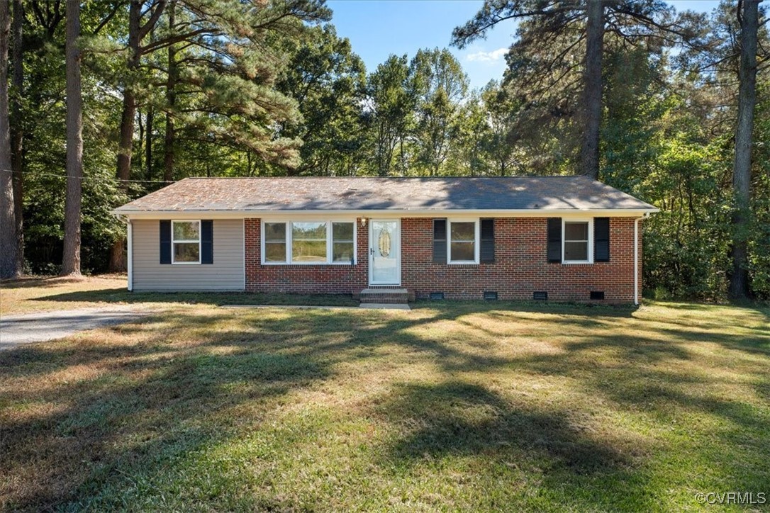 9217 South Quay Road Suffolk, VA 23437 - Photo 3 of 46 a view of a yard with a house