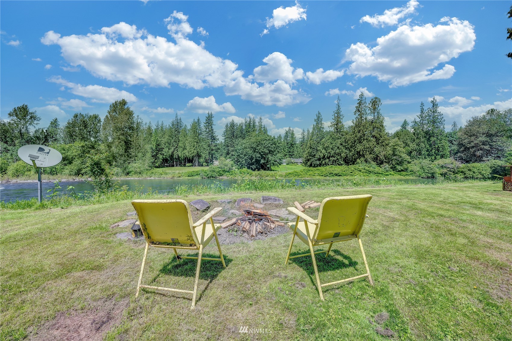 35420 Southeast David Powell Road Fall City, WA 98024 - Photo 25 of 25 a view of a backyard with furniture and a garden