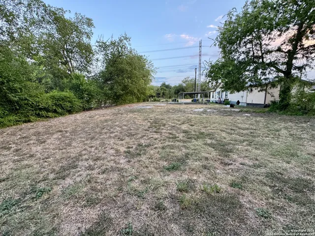 a view of outdoor space and yard