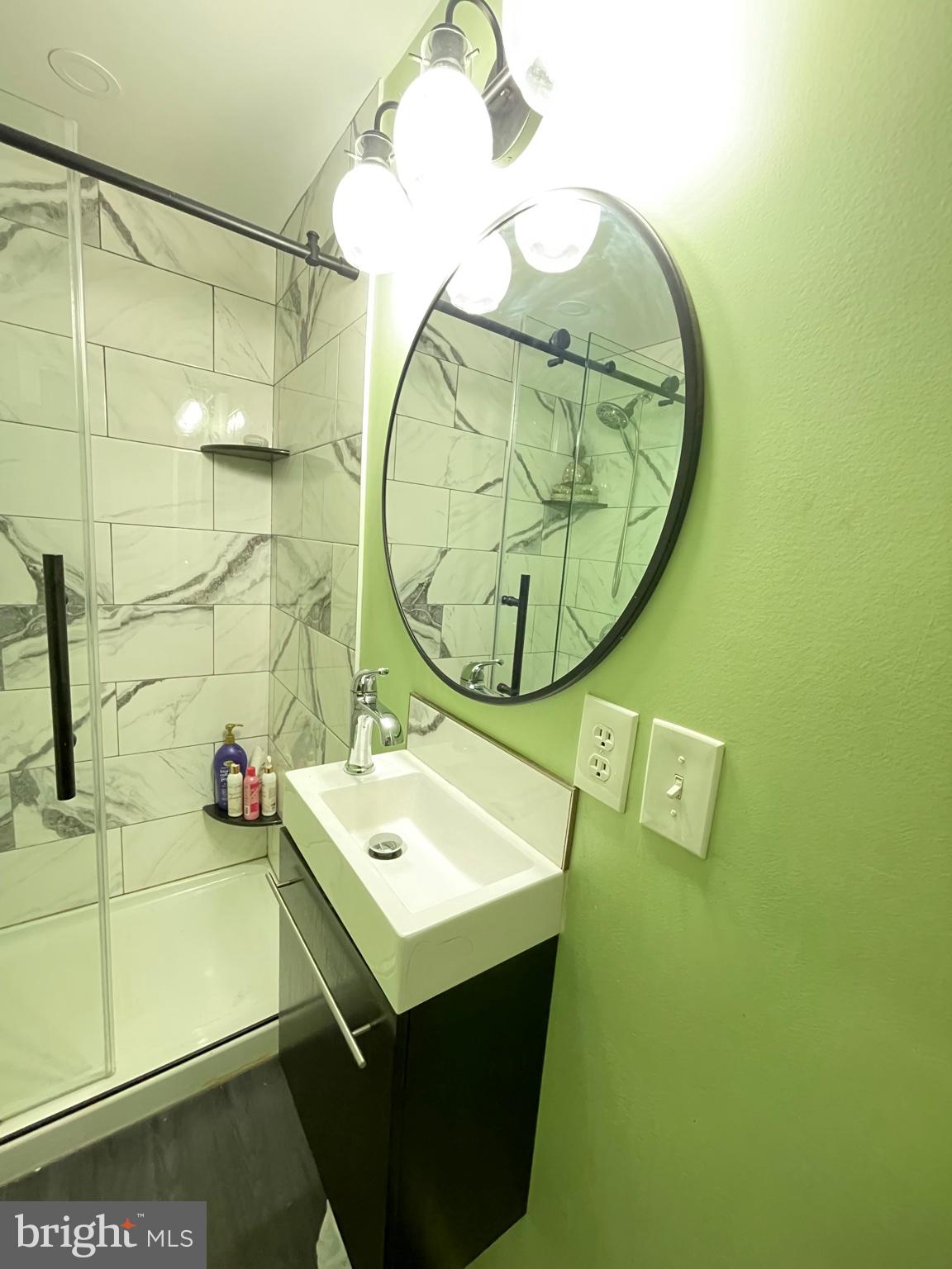 735 Grant Road Folcroft, PA 19032 - Photo 34 of 39 Modern bathroom with sleek design.