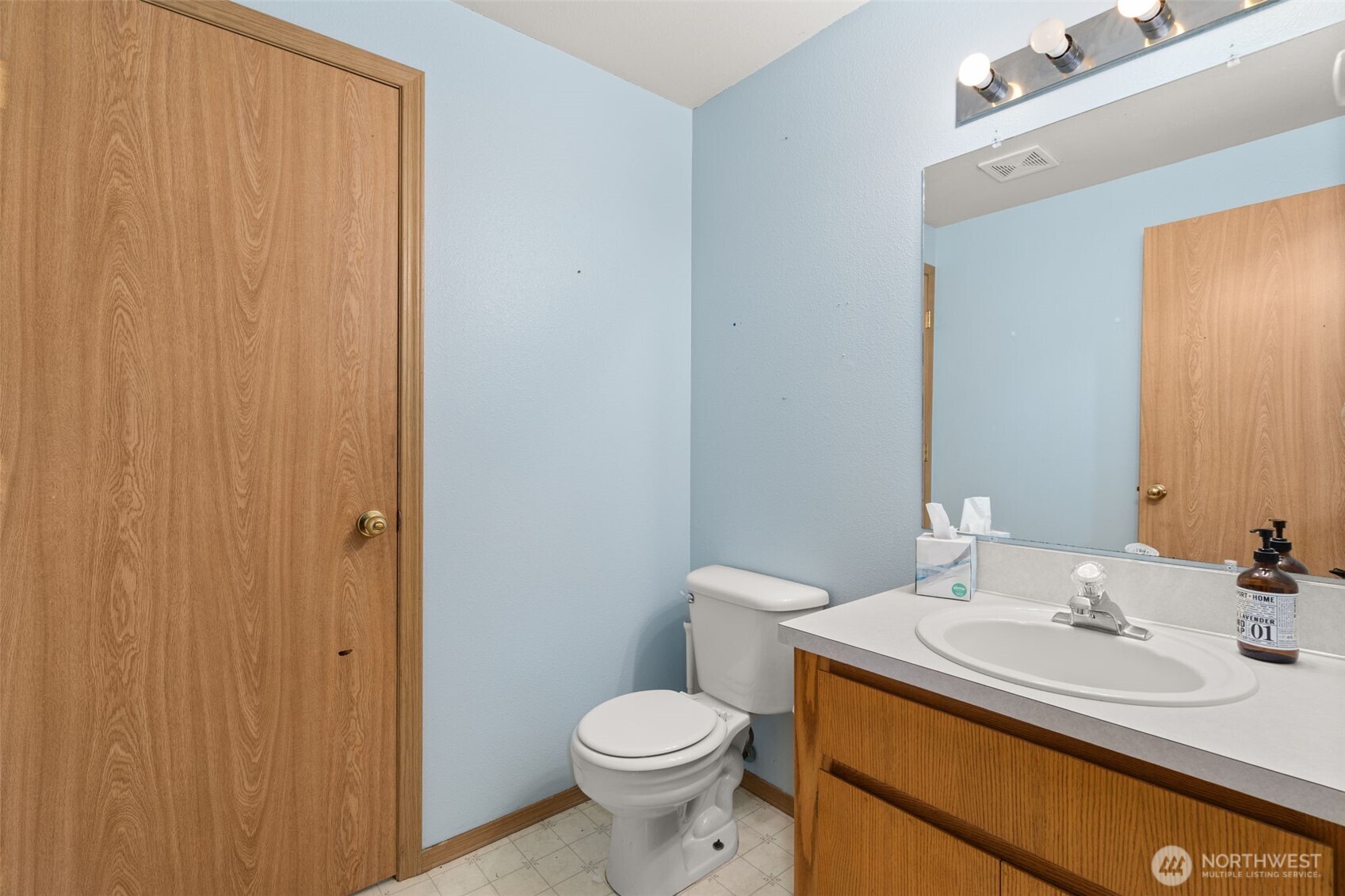 150-126 Allen Road Onalaska, WA 98570 - Photo 19 of 34 a bathroom with a sink a toilet and a mirror