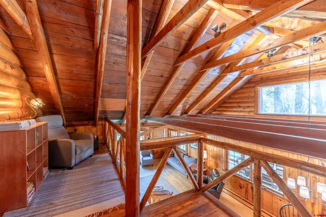 a view of outdoor space with wooden floor and stairs