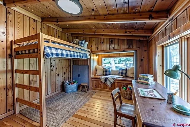 a view of a chairs and table in a room