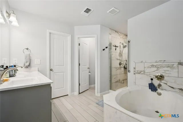 a bathroom with a sink and toilet