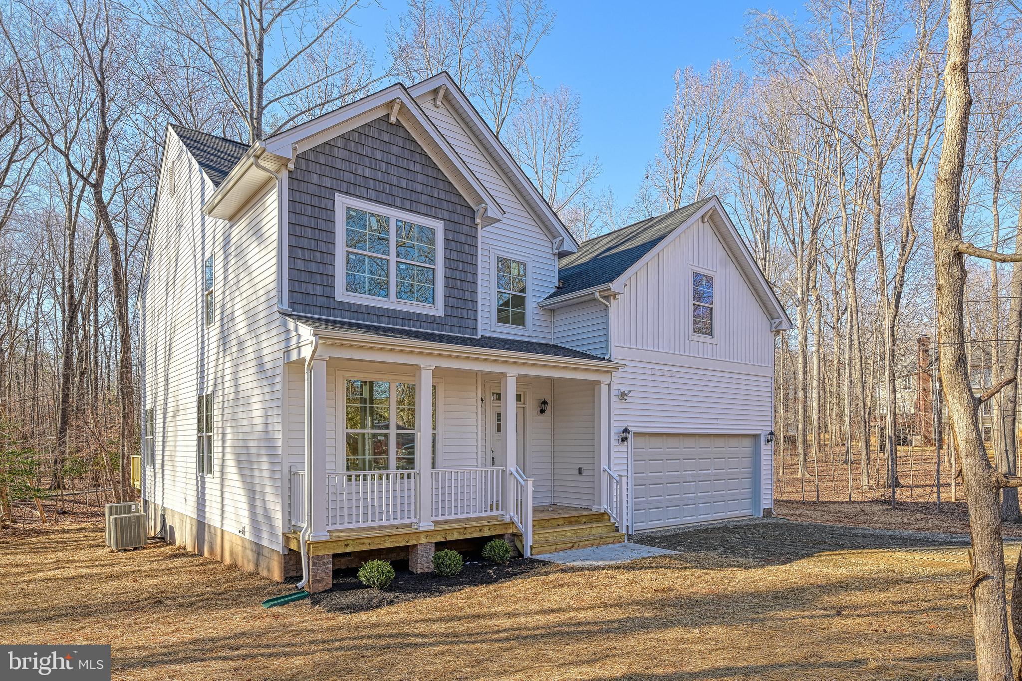 172 Covenant Way Bumpass, VA 23024 - Photo 3 of 56 a view of a house with a patio and yard