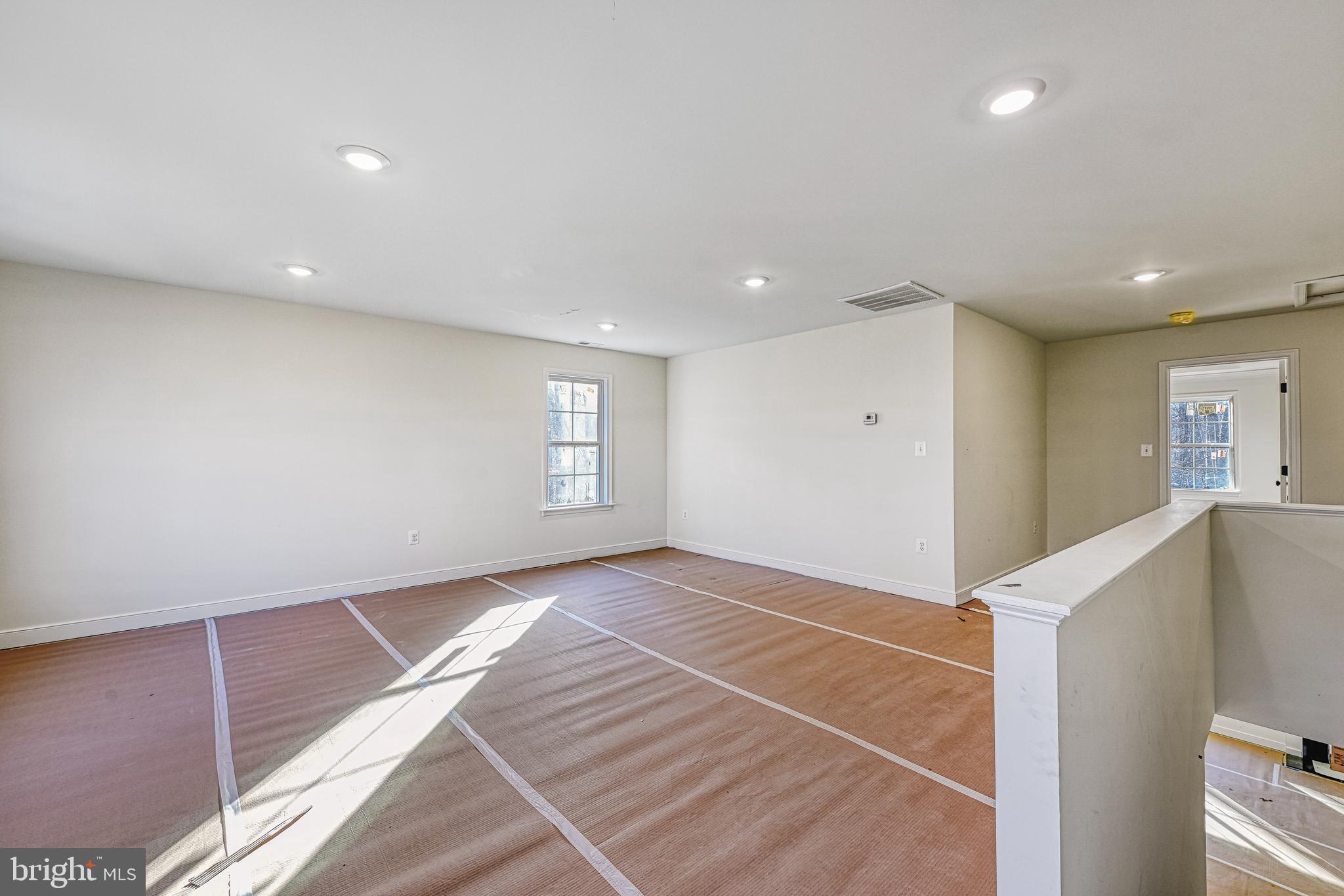 172 Covenant Way Bumpass, VA 23024 - Photo 34 of 56 a view of an empty room with window and wooden floor