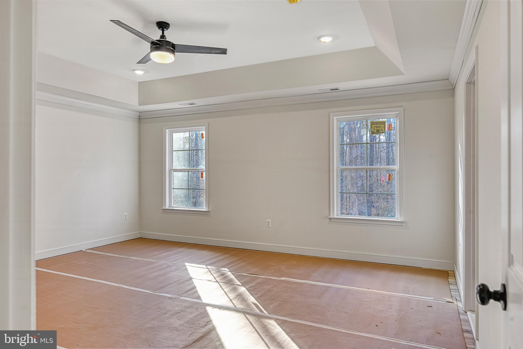 172 Covenant Way Bumpass, VA 23024 - Photo 38 of 56 a view of a livingroom with a ceiling fan and window