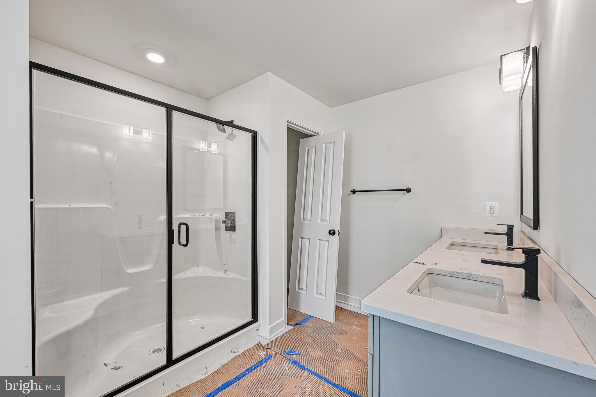 172 Covenant Way Bumpass, VA 23024 - Photo 41 of 56 a bathroom with a shower and a sink