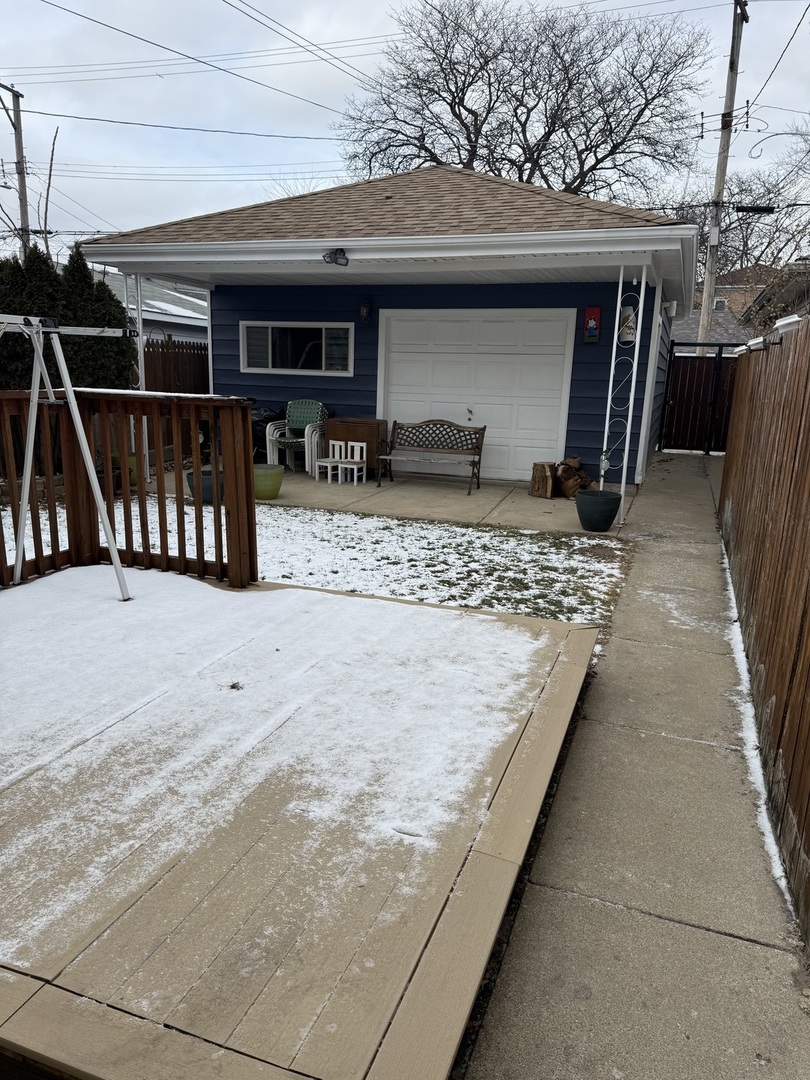 3704 West 58th Street Chicago, IL 60629 - Photo 11 of 12 a view of a house with a patio