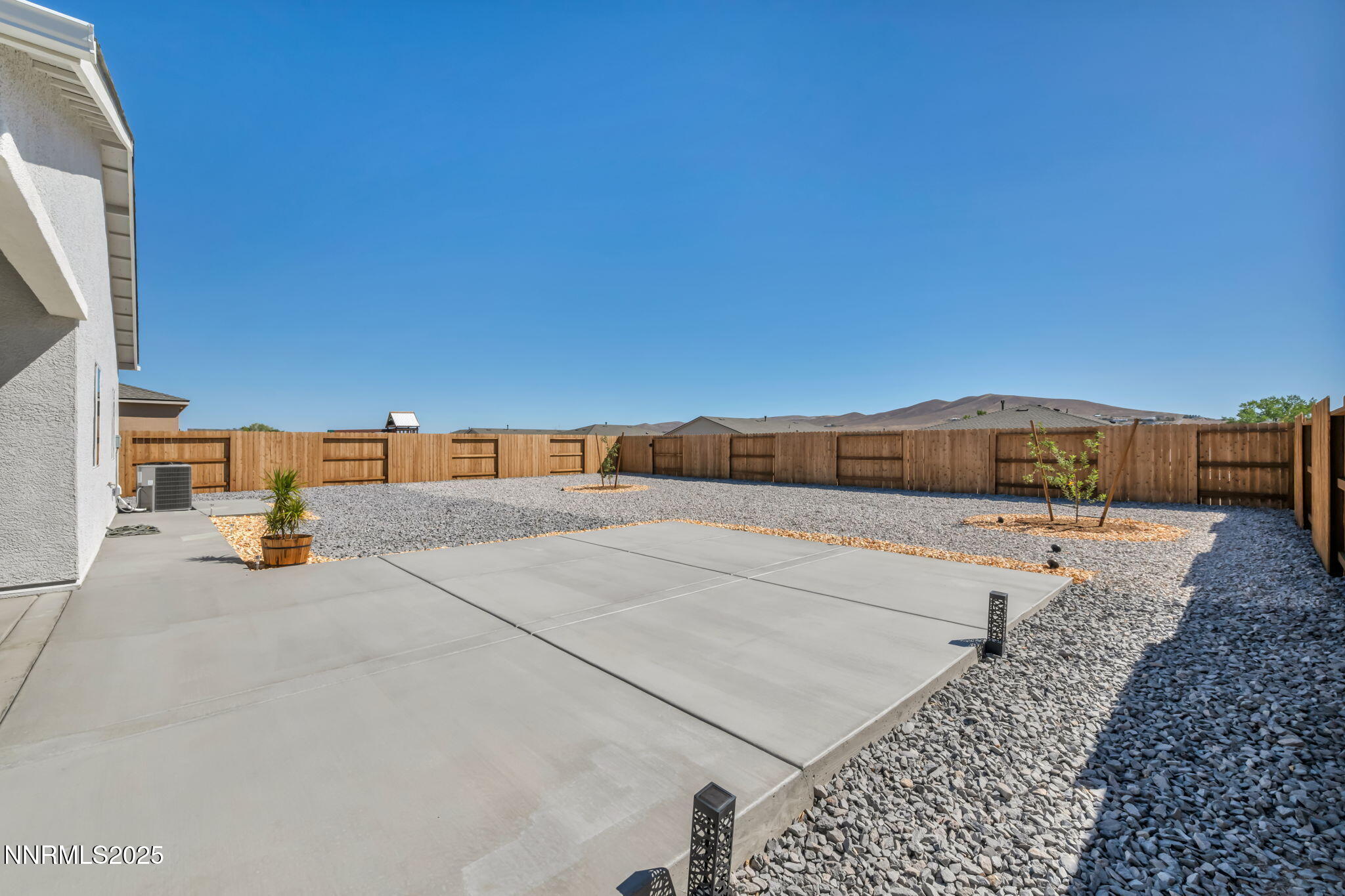 1019 Anthony Court Fernley, NV 89408 - Photo 16 of 55 a view of a back yard of the house