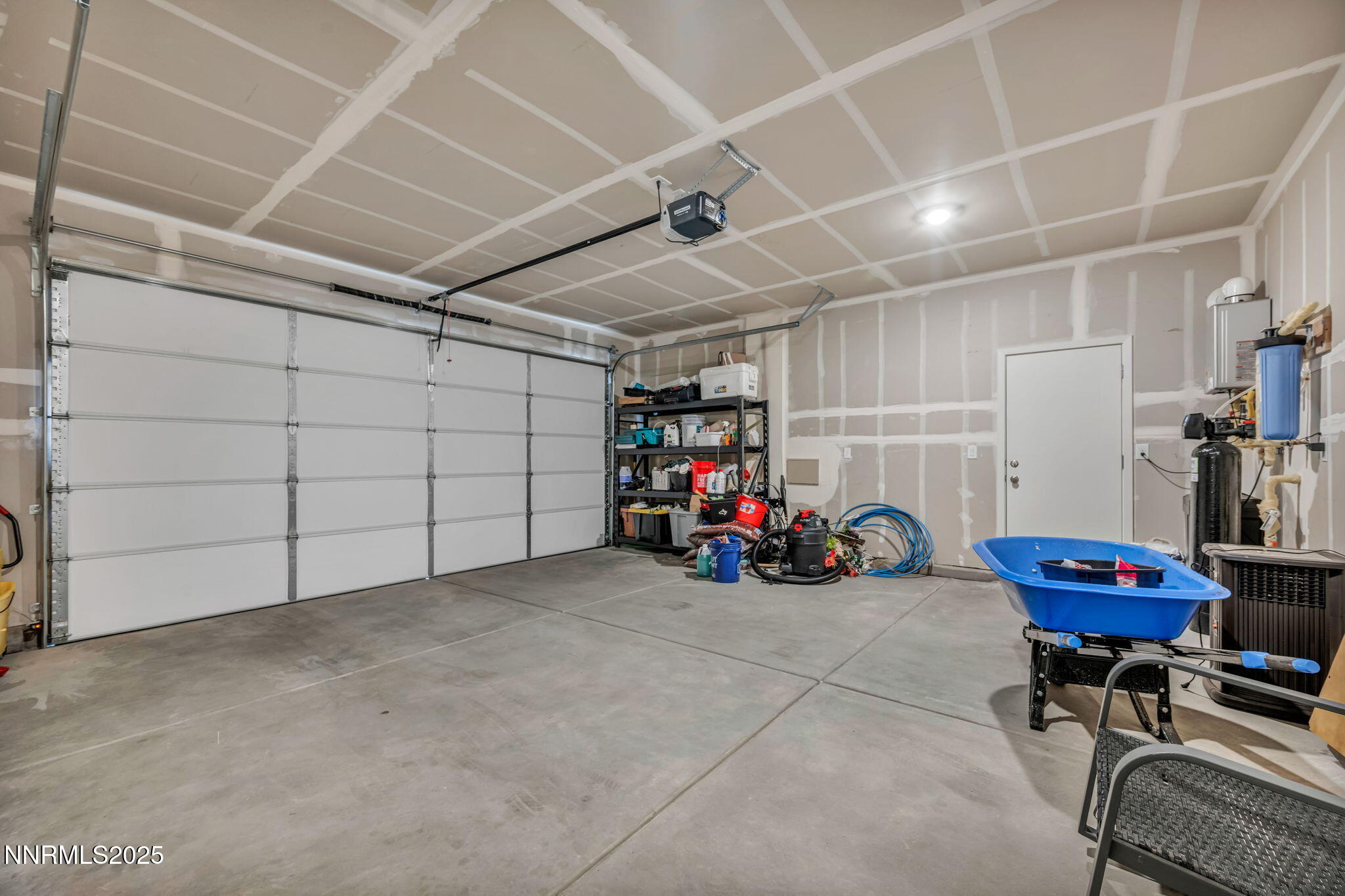 1019 Anthony Court Fernley, NV 89408 - Photo 22 of 55 a view of a garage with rack and bicycle