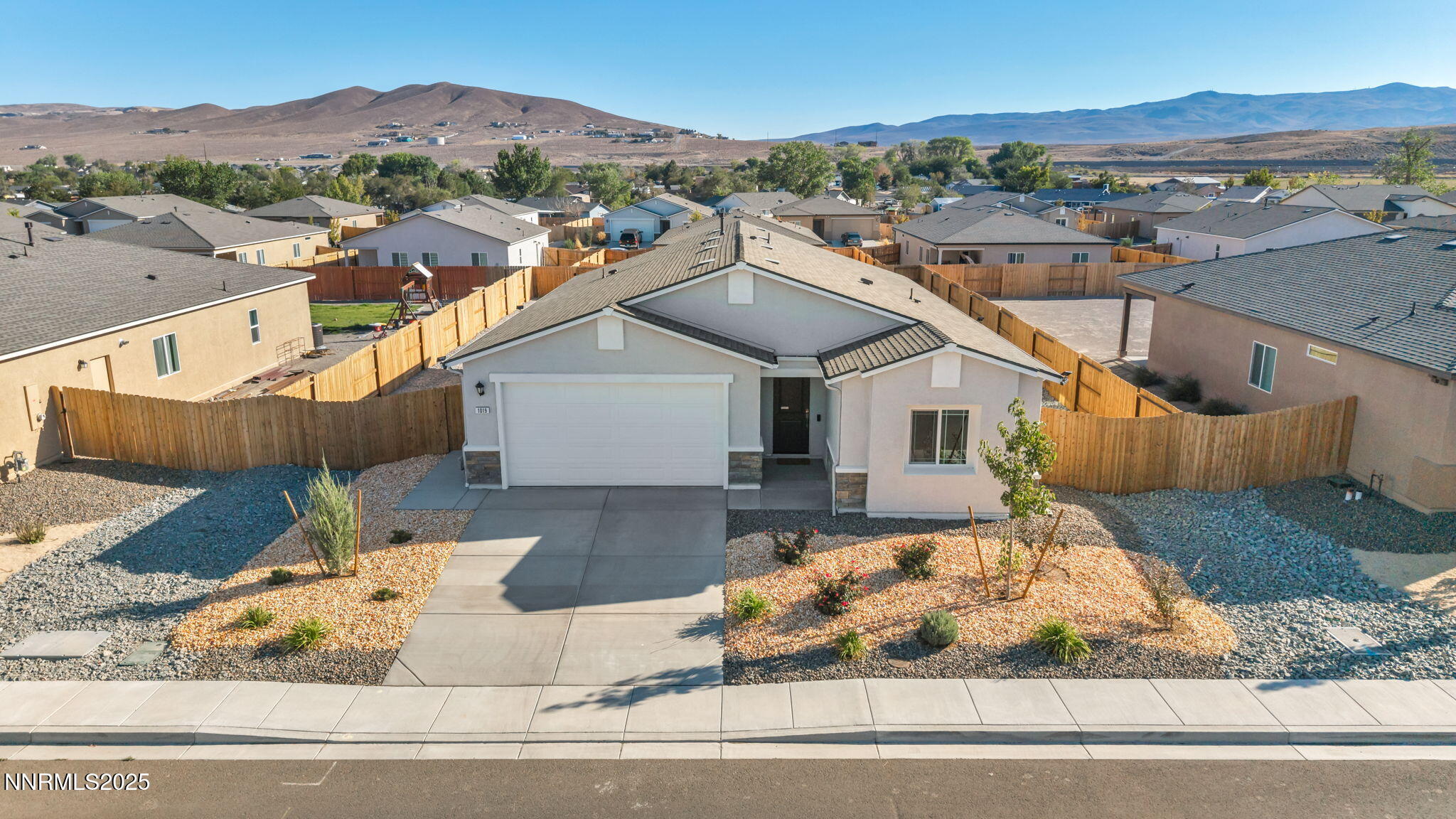 1019 Anthony Court Fernley, NV 89408 - Photo 39 of 55 a view of a house with a yard