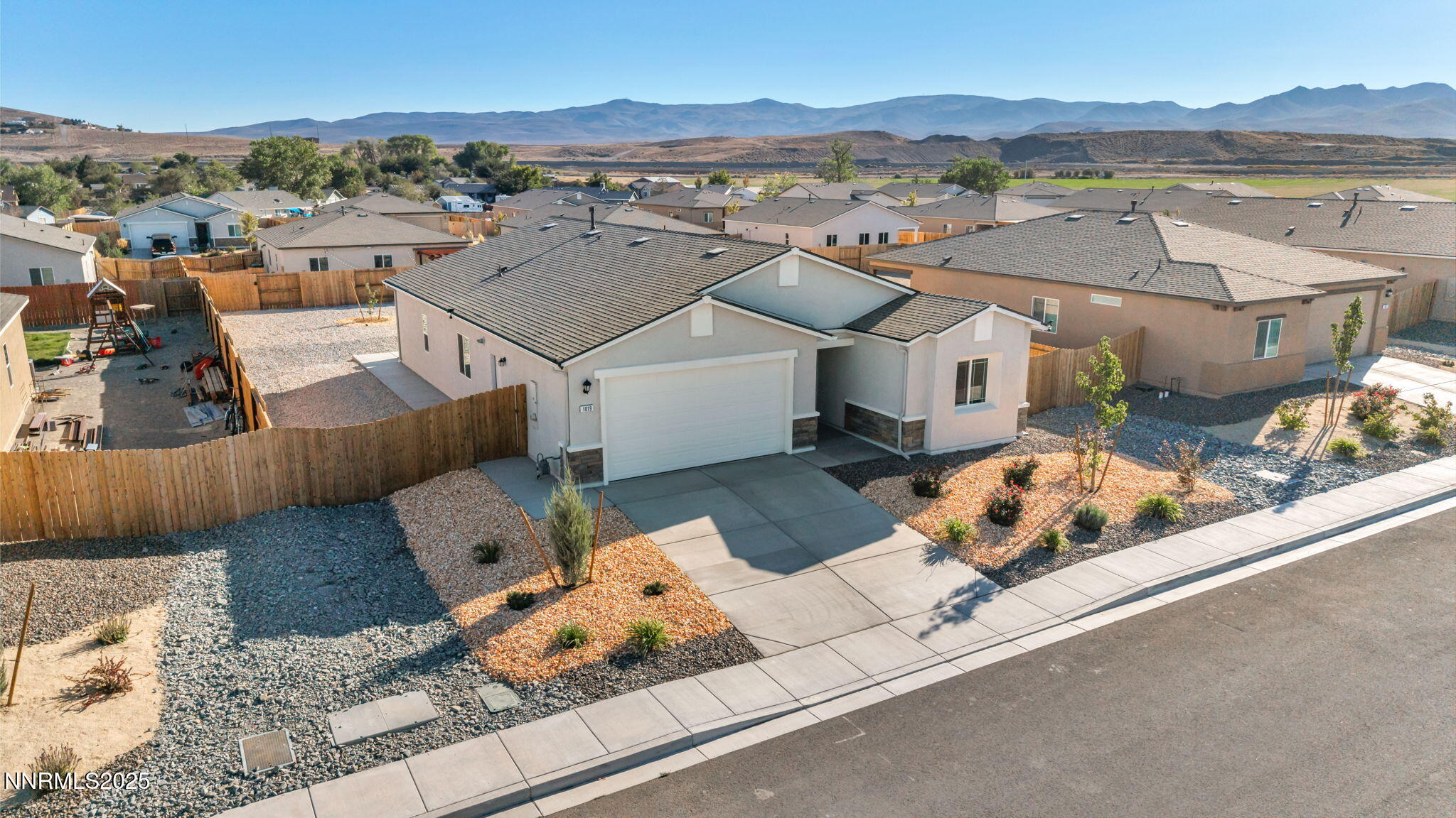 1019 Anthony Court Fernley, NV 89408 - Photo 40 of 55 aerial view of a house with a mountain
