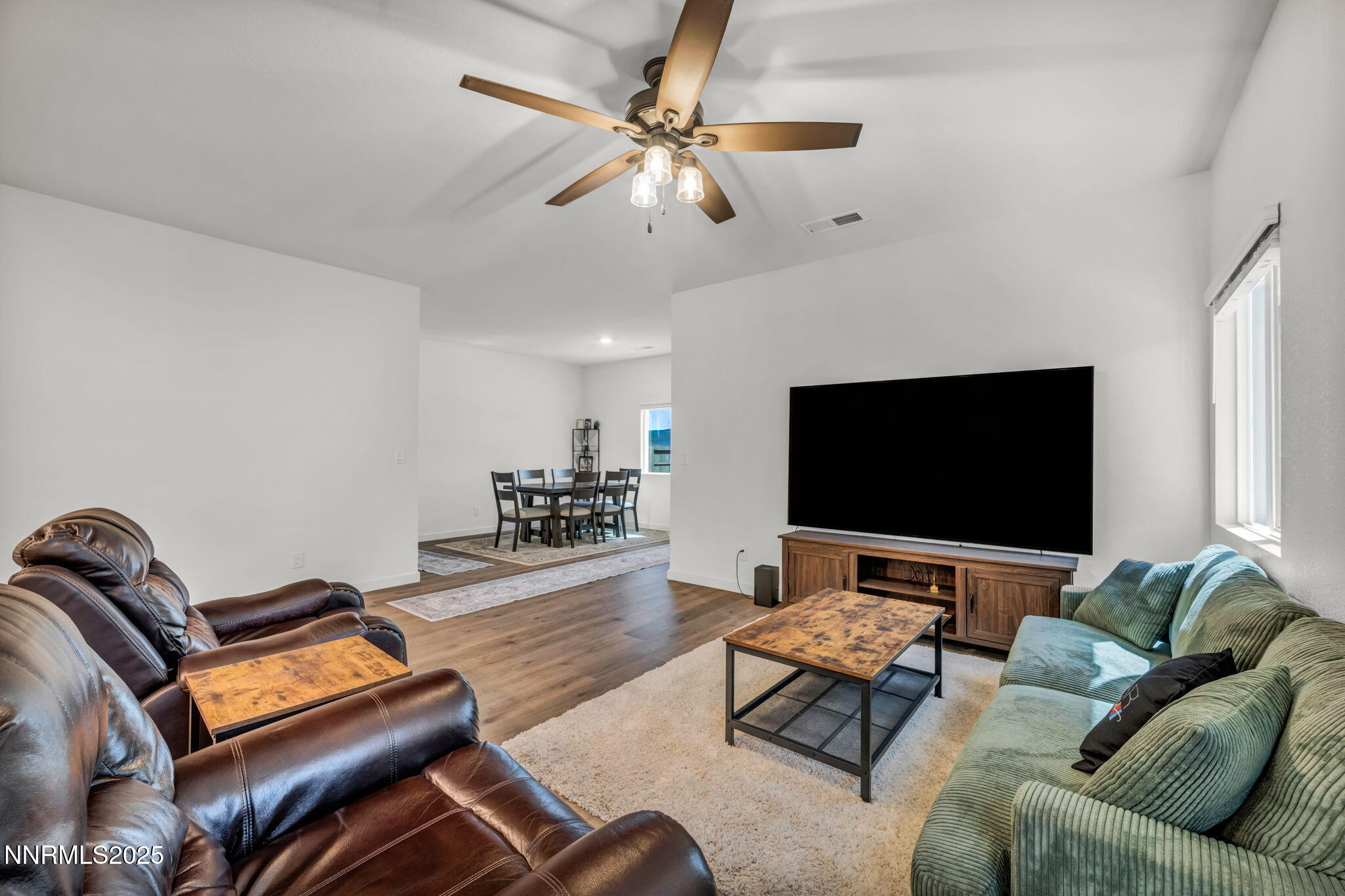 1019 Anthony Court Fernley, NV 89408 - Photo 7 of 55 a living room with furniture and a flat screen tv