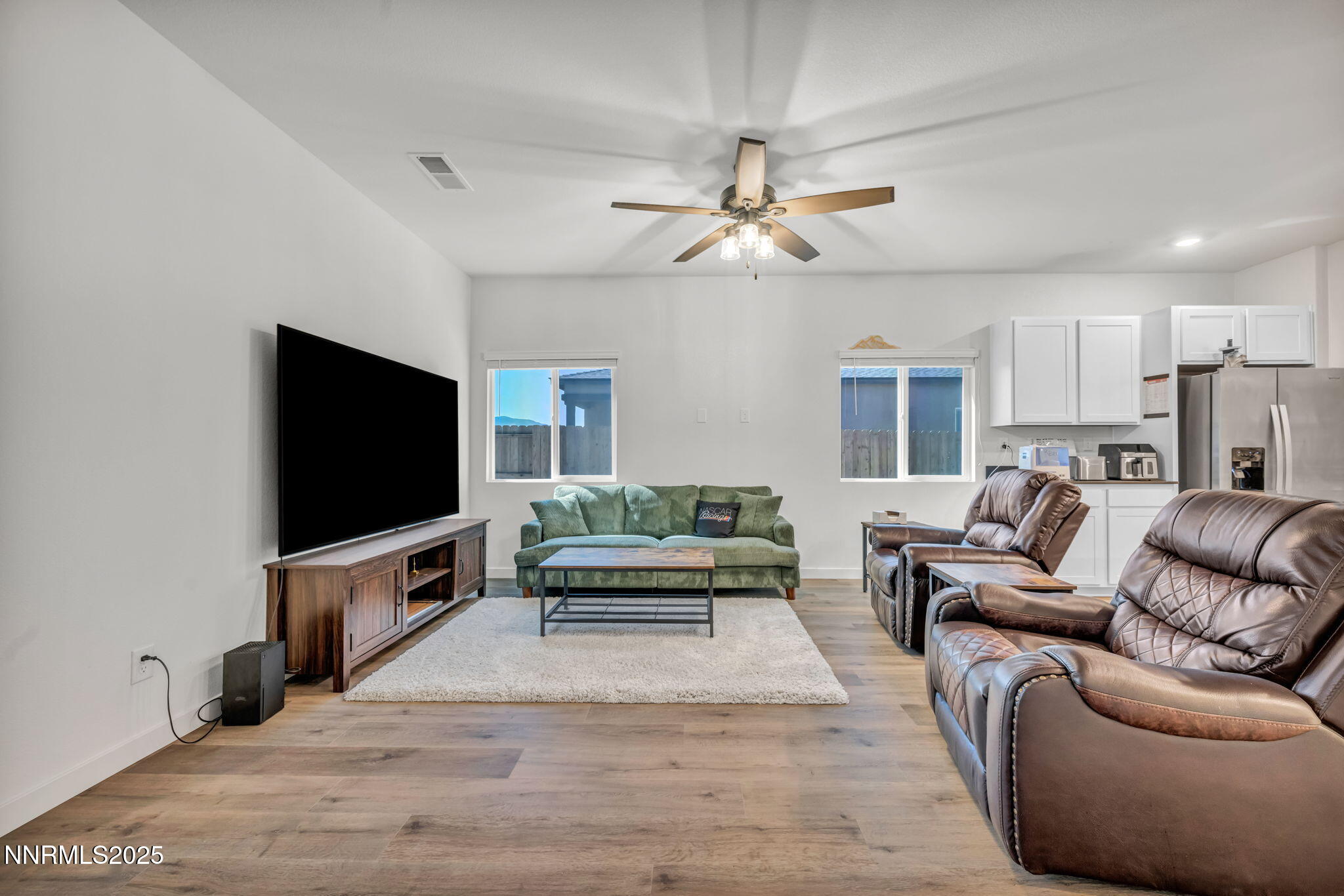 1019 Anthony Court Fernley, NV 89408 - Photo 9 of 55 a living room with furniture and a flat screen tv