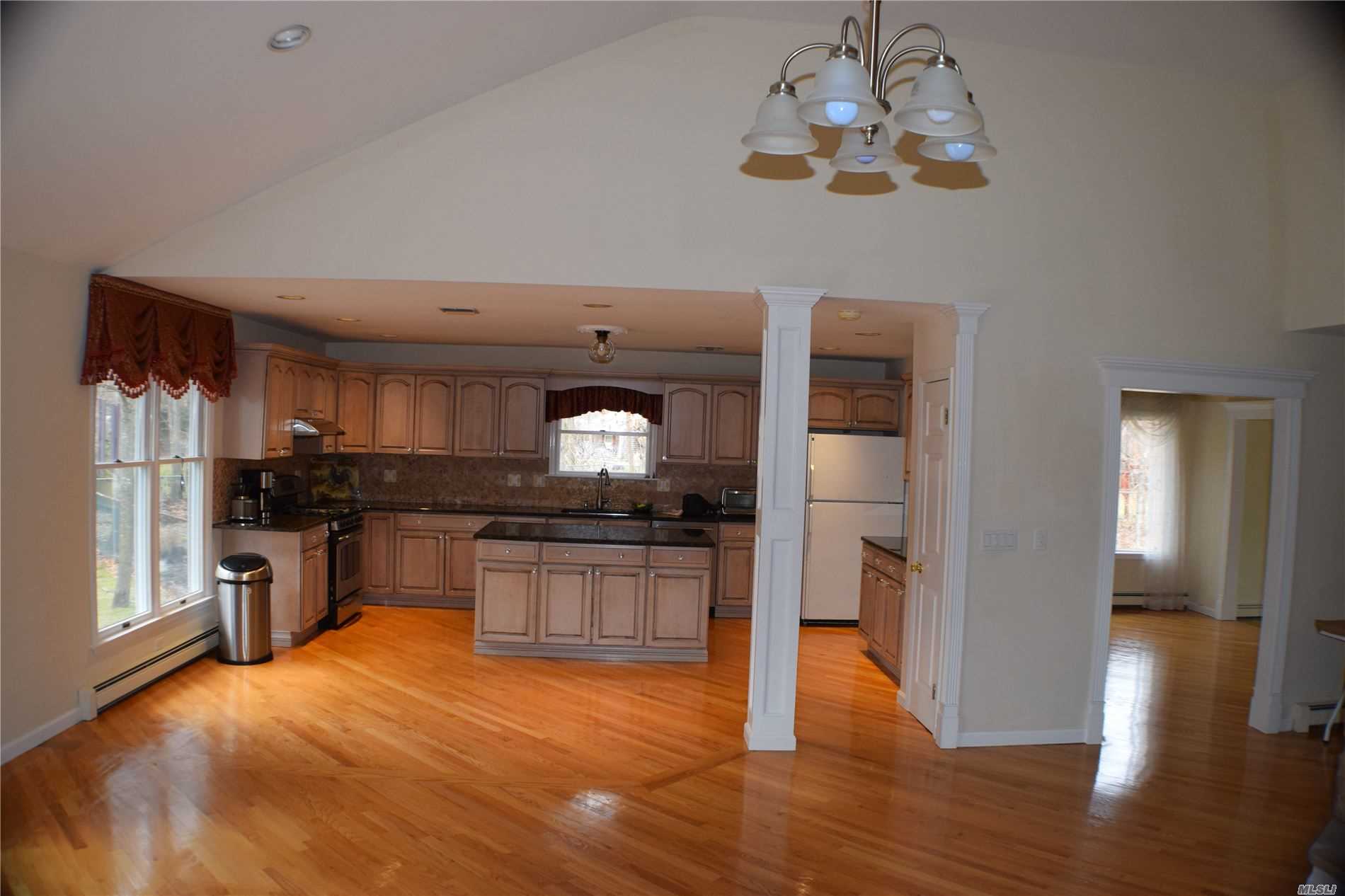 34 Jomar Road Shoreham, NY 11786 - Photo 8 of 20 den into kitchen