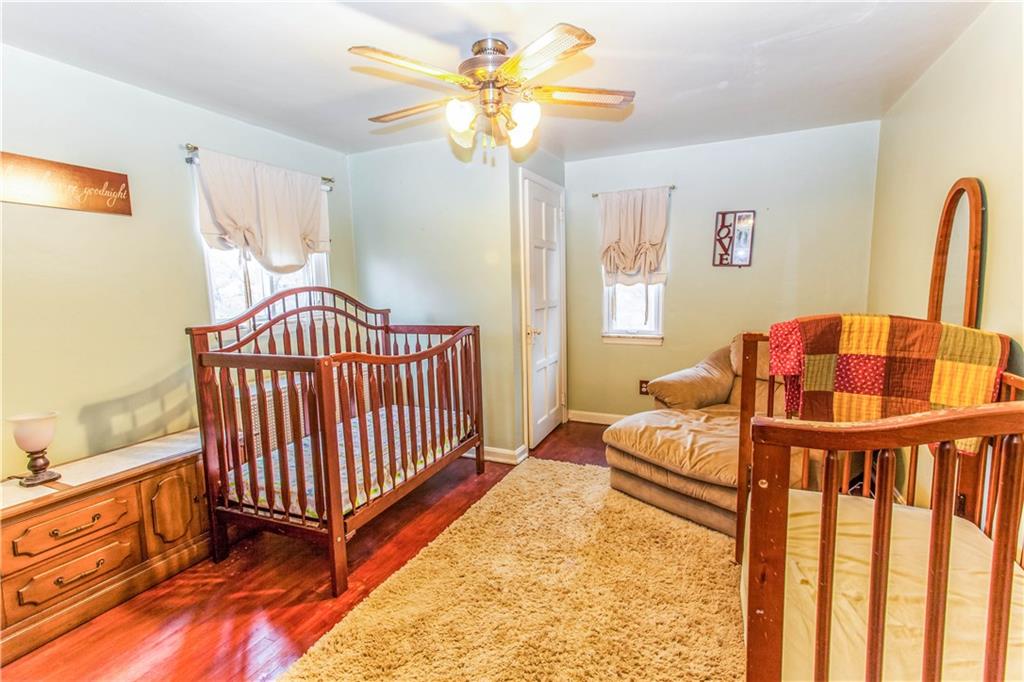 823 Agnew Road Baldwin, PA 15227 - Photo 13 of 21 The 2nd Bedrooms is very spacious at 15x9 w/Hardwood floors and a ceiling fan!