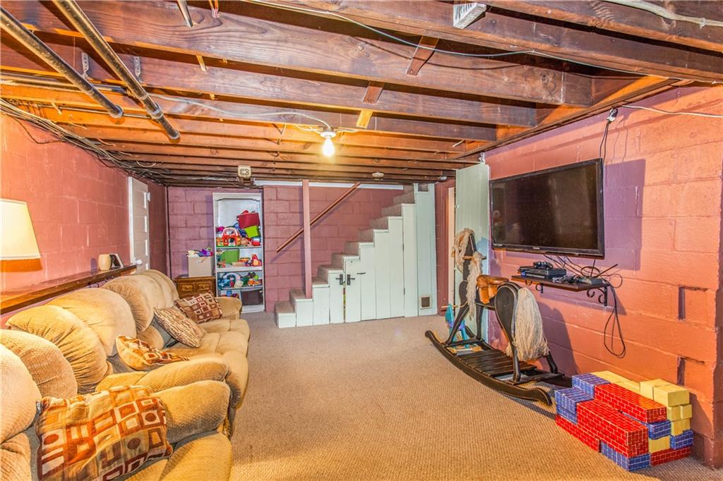 823 Agnew Road Baldwin, PA 15227 - Photo 16 of 21 The Basement has carpet, just needs some dry wall and a ceiling to create a finished Game Room!