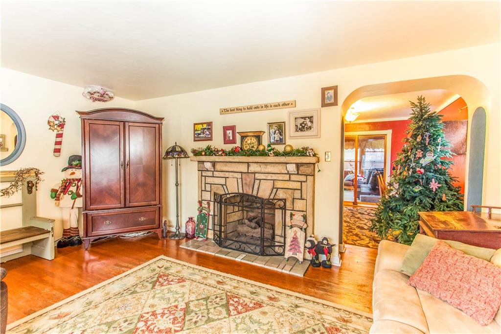 823 Agnew Road Baldwin, PA 15227 - Photo 3 of 21 The awesome Stone Fireplace Greets you in the Living Room!