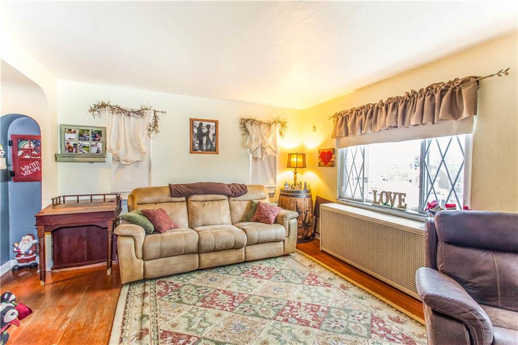 823 Agnew Road Baldwin, PA 15227 - Photo 5 of 21 The Living Room has neutral dcor & Hardwood Floors!