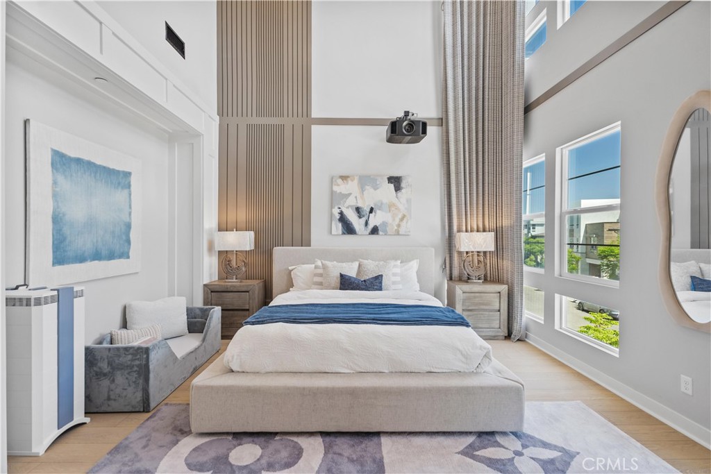 598 Alder Way Montebello, CA 90640 - Photo 20 of 56 a spacious bedroom with a bed and a window