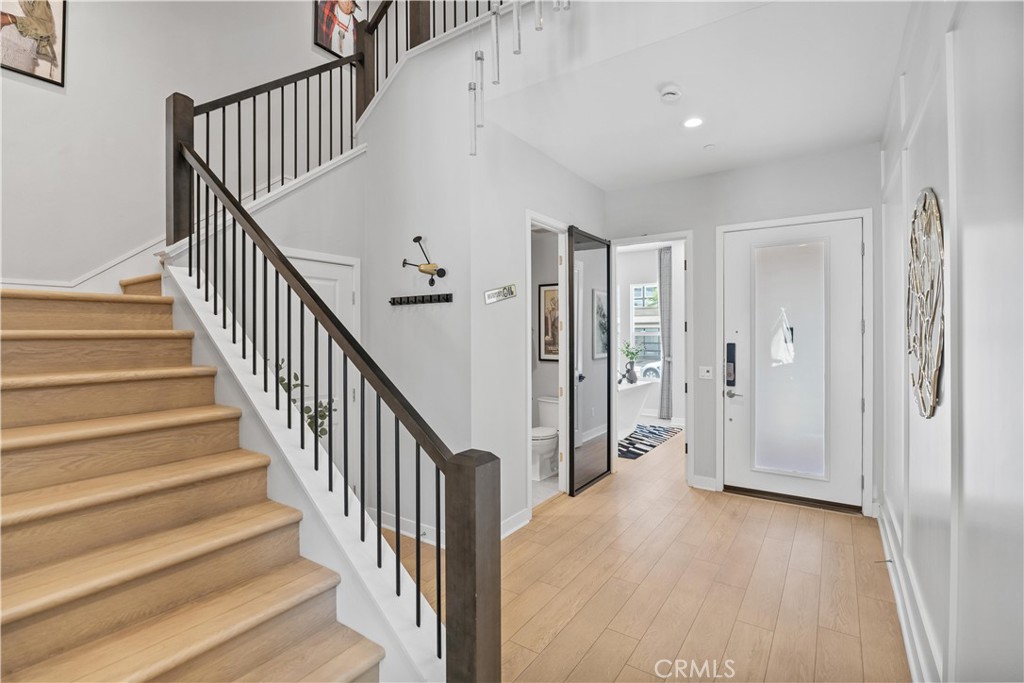 598 Alder Way Montebello, CA 90640 - Photo 2 of 56 a view of a hallway with wooden floor and entryway
