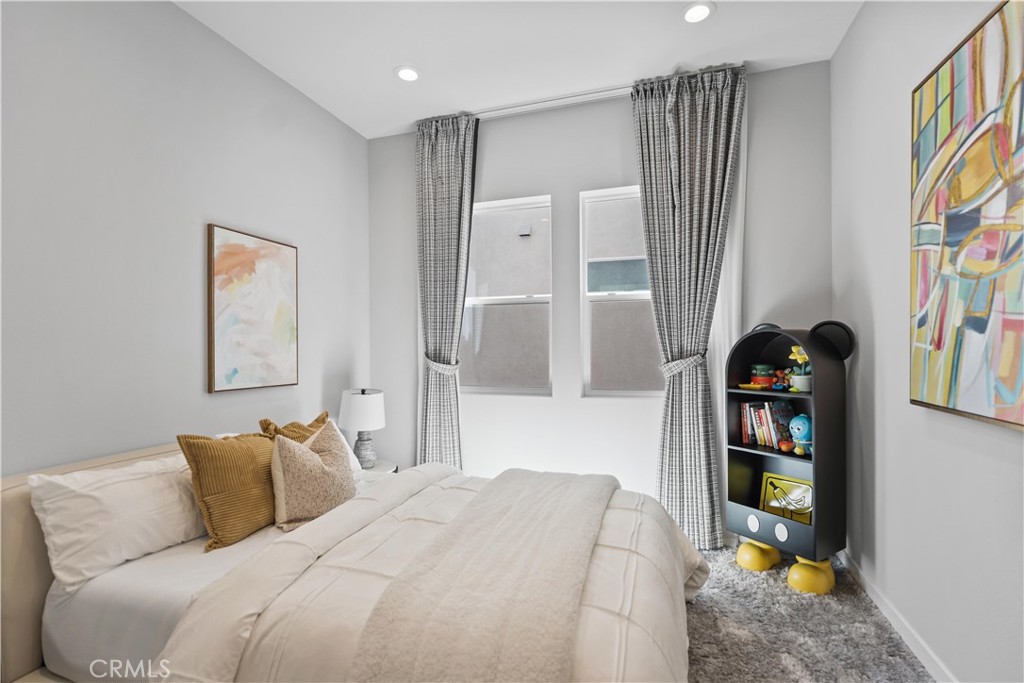 598 Alder Way Montebello, CA 90640 - Photo 27 of 56 a bedroom with a bed and a window