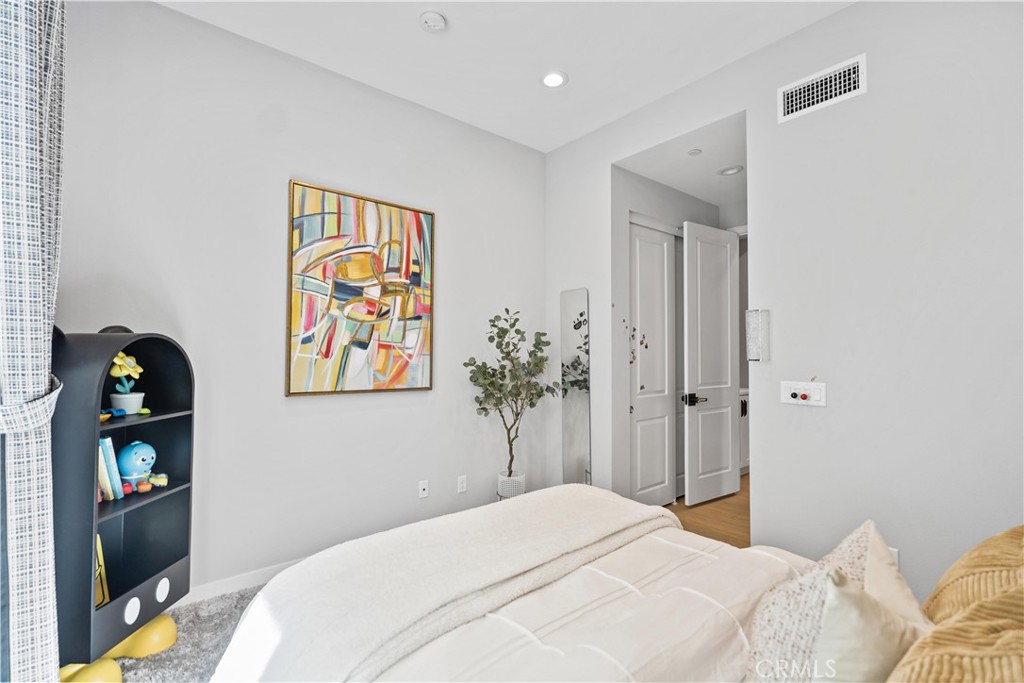 598 Alder Way Montebello, CA 90640 - Photo 28 of 56 a bedroom with a bed and a view of bathroom