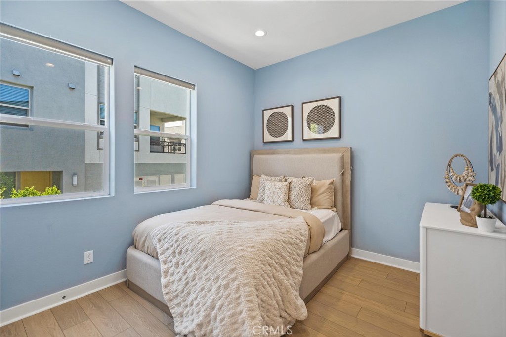 598 Alder Way Montebello, CA 90640 - Photo 29 of 56 a bedroom with a bed and painting on the wall