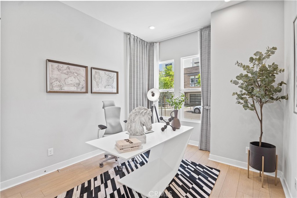 598 Alder Way Montebello, CA 90640 - Photo 4 of 56 a view of a dining room with furniture window and wooden floor