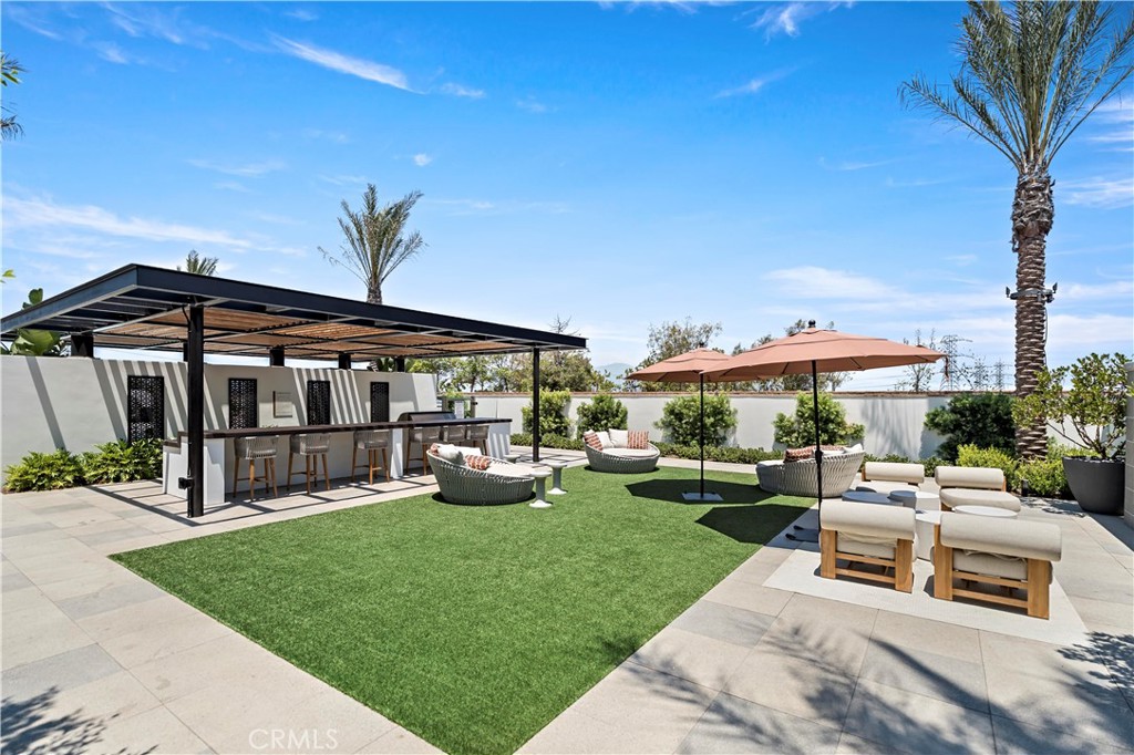 598 Alder Way Montebello, CA 90640 - Photo 53 of 56 a view of a house with backyard sitting area and garden