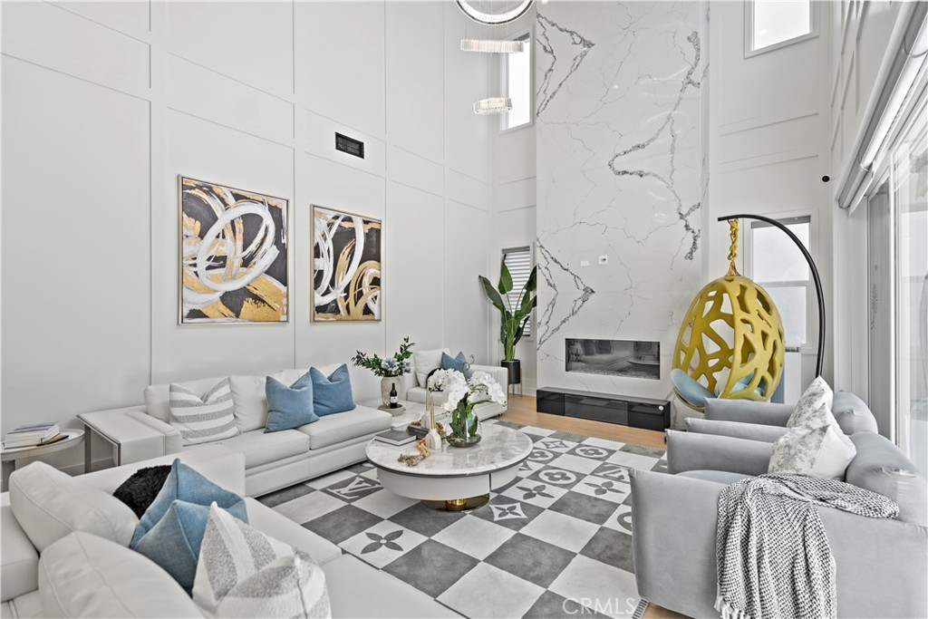 598 Alder Way Montebello, CA 90640 - Photo 8 of 56 a living room with furniture and painting on the wall