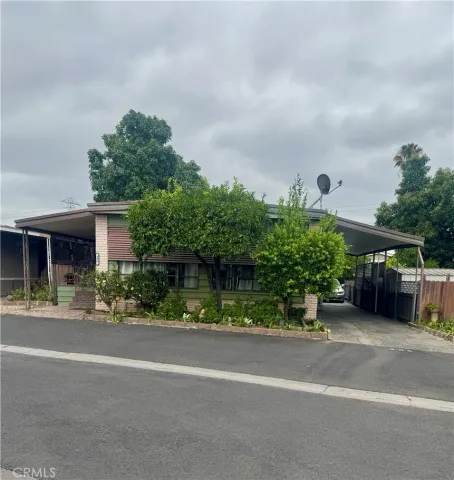 front view of a house with a street