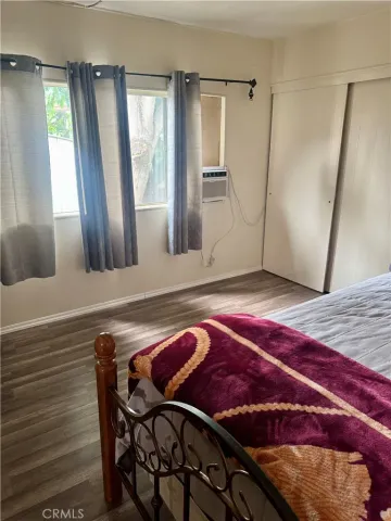 a view of a living room and hardwood floor
