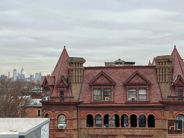 a view of houses with a city