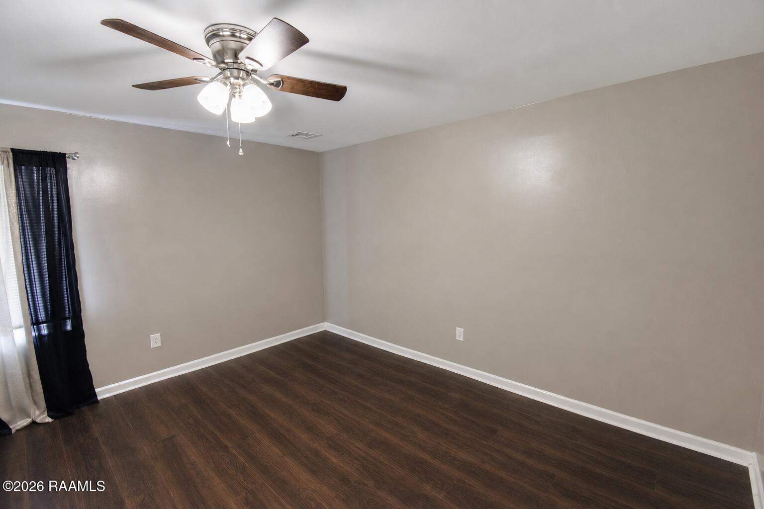 156 Oak Road Church Point, LA 70525 - Photo 8 of 17 Bright, neutral empty bedroom