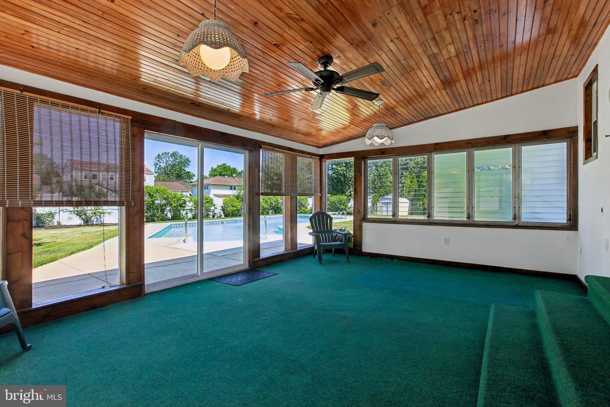 56 Whitehall Road Hamilton, NJ 08690 - Photo 23 of 37 Bright sunroom with poolside views.