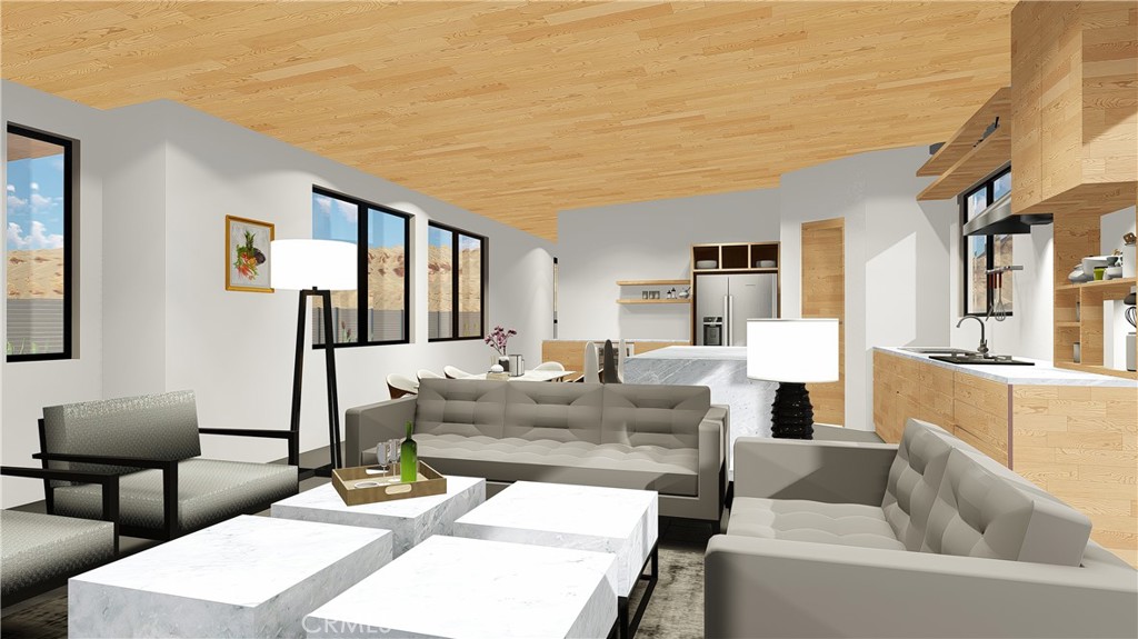 64845 Sun Oro Road Joshua Tree, CA 92252 - Photo 14 of 52 a living room with furniture and a large window