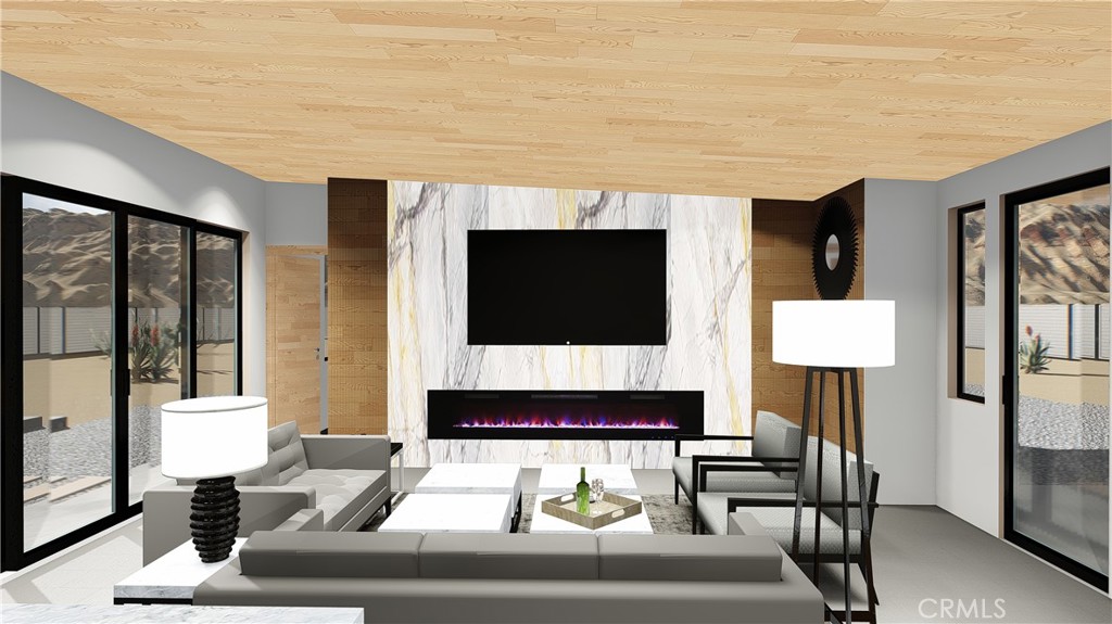 64845 Sun Oro Road Joshua Tree, CA 92252 - Photo 17 of 52 a living room with furniture and a flat screen tv