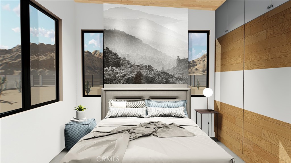 64845 Sun Oro Road Joshua Tree, CA 92252 - Photo 20 of 52 a bedroom with a large bed and a window