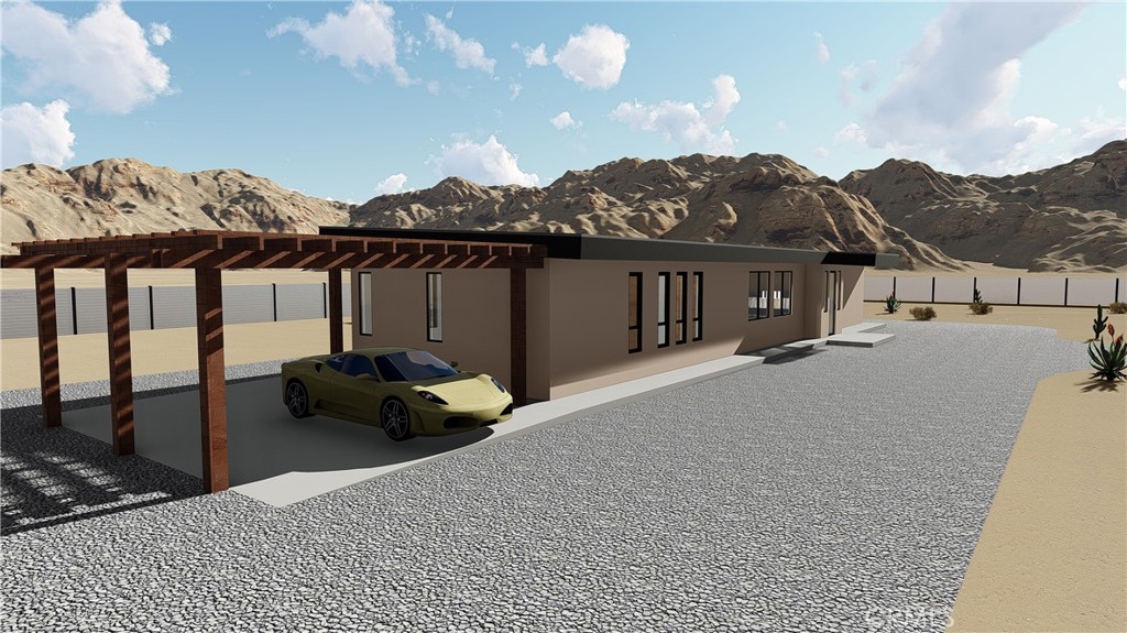 64845 Sun Oro Road Joshua Tree, CA 92252 - Photo 21 of 52 a balcony with furniture and a potted plant