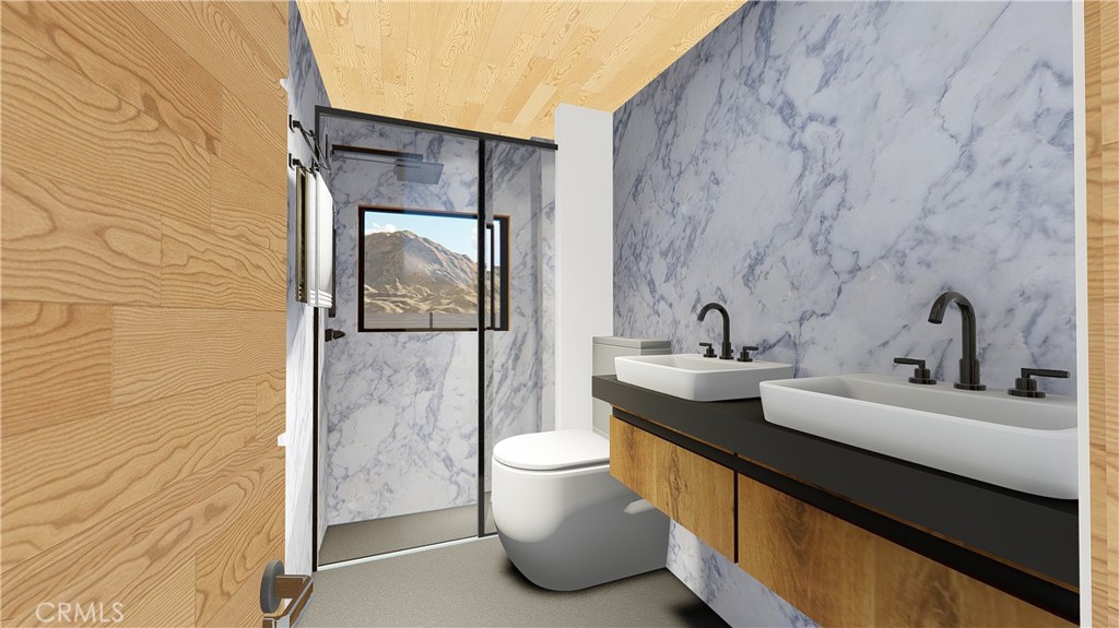 64845 Sun Oro Road Joshua Tree, CA 92252 - Photo 25 of 52 a bathroom with a toilet sink and mirror