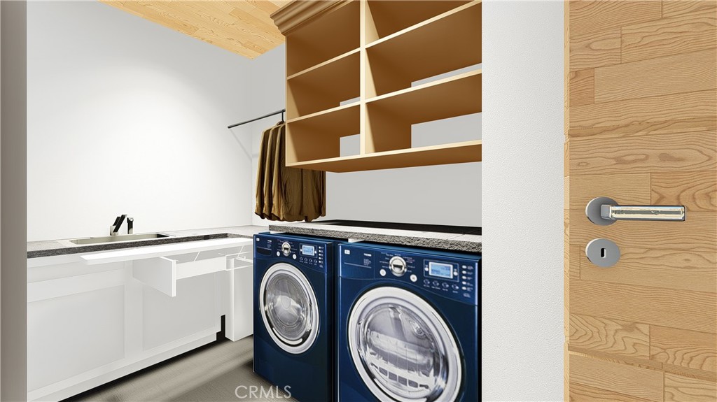 64845 Sun Oro Road Joshua Tree, CA 92252 - Photo 29 of 52 a utility room with dryer and washer