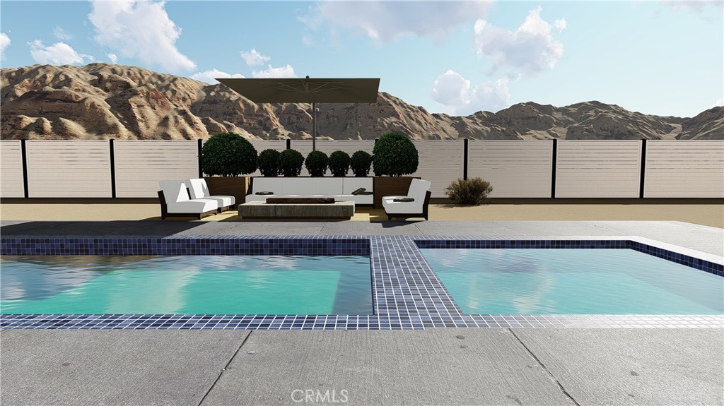 64845 Sun Oro Road Joshua Tree, CA 92252 - Photo 6 of 52 a view of a swimming pool with a patio