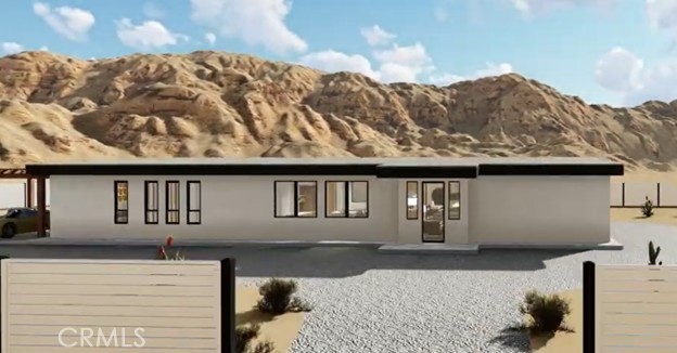 64845 Sun Oro Road Joshua Tree, CA 92252 - Photo 9 of 52 a view of a house with a snow on the road