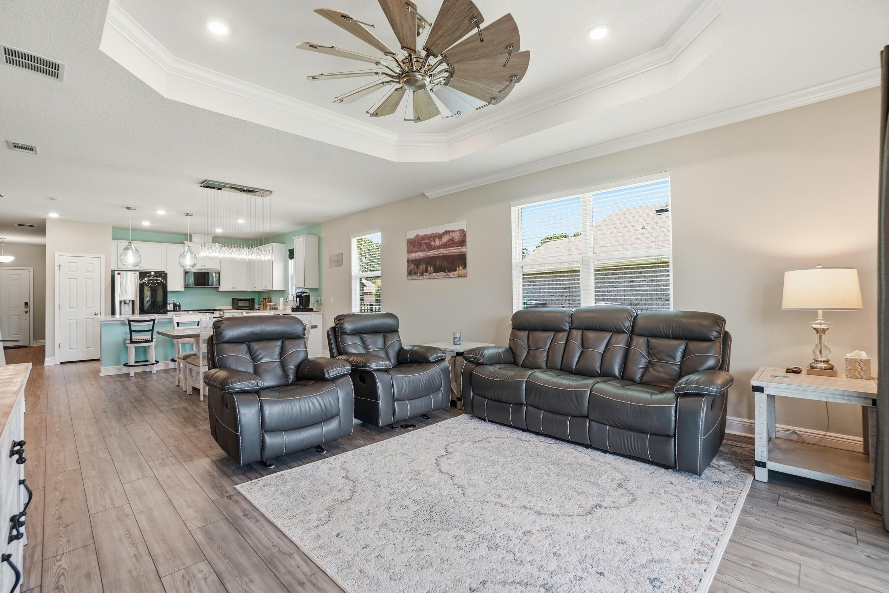 525 Windchime Way Freeport, FL 32439 - Photo 14 of 59 a living room with furniture and wooden floor