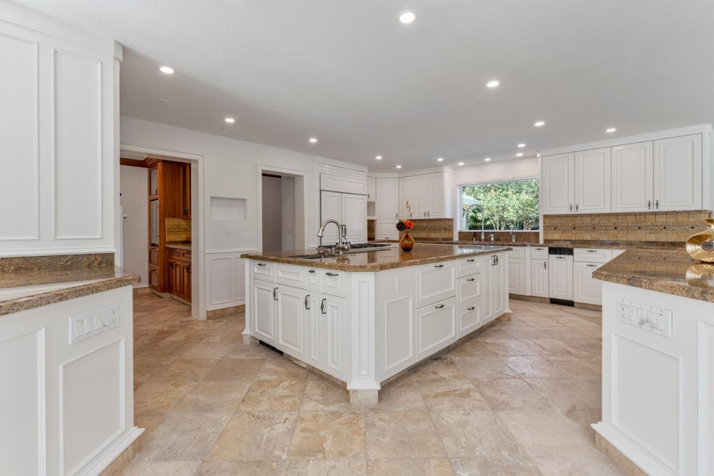 1080 Finley Road Pleasanton, CA 94588 - Photo 32 of 85 a large kitchen with stainless steel appliances granite countertop a stove a sink and a refrigerator