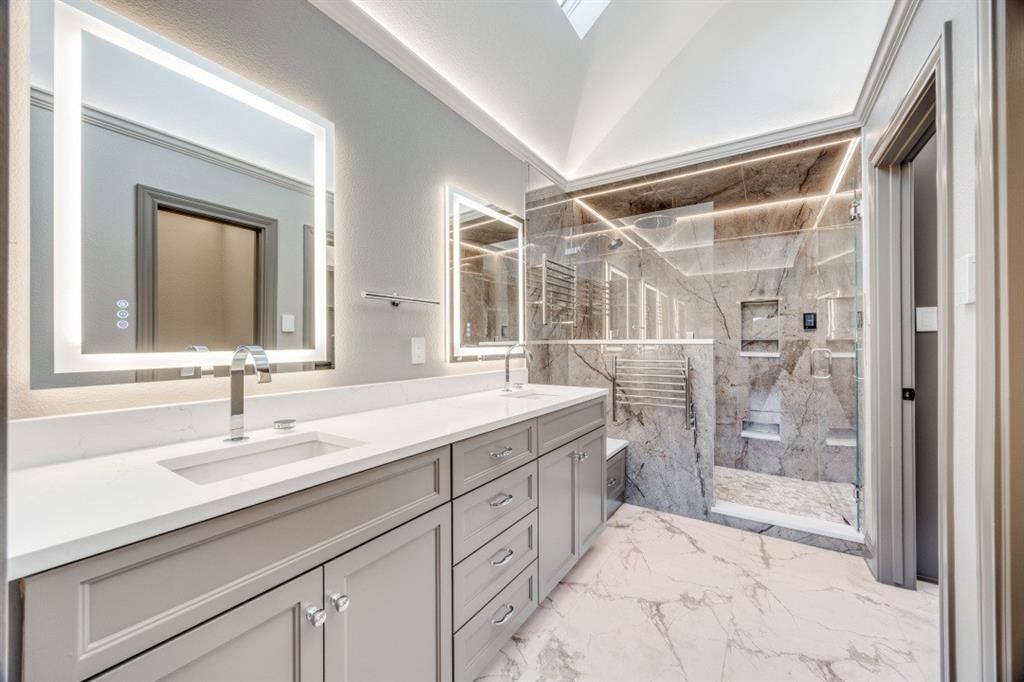 3244 Joe Davis Road Whitewright, TX 75491 - Photo 14 of 28 Full bathroom with marble finish flooring, double vanity, and a marble finish shower