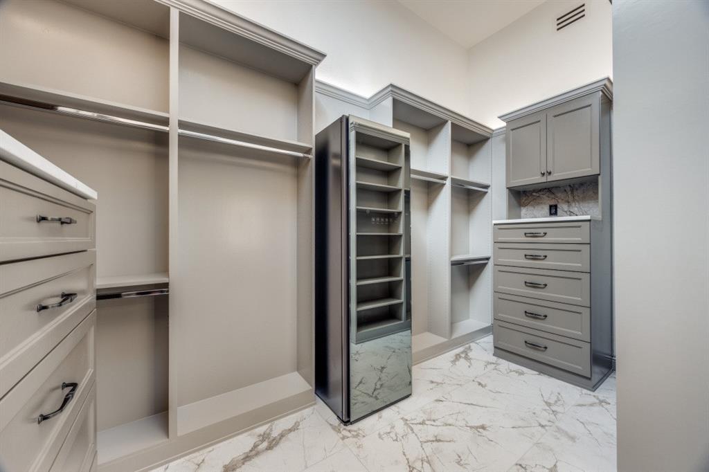 3244 Joe Davis Road Whitewright, TX 75491 - Photo 15 of 28 Walk in closet featuring light marble finish flooring
